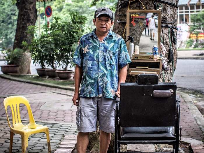 5. Vietnam — about 13.3% of the population are self-employed. Vietnam is known for its prolific stalls and "street barbers," as pictured here.