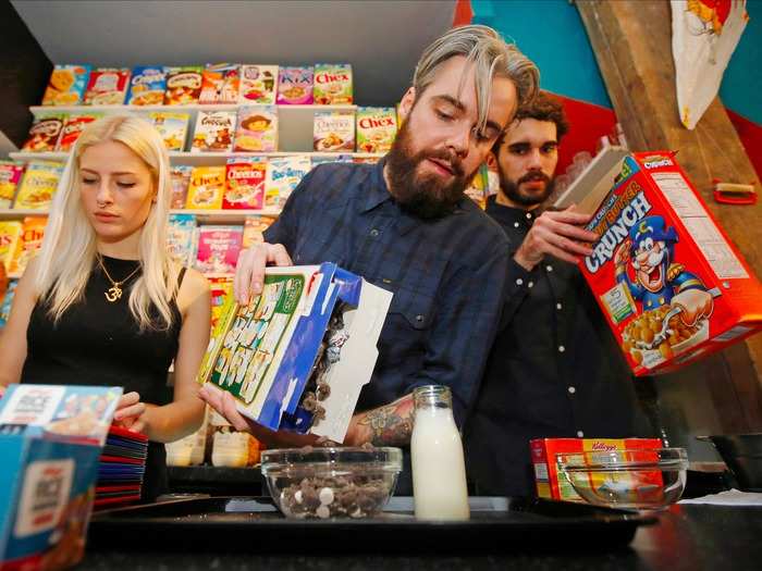 Cereal Killer Cafe, in Shoreditch, London, is the idea of Gary and Alan Keery, twins from Belfast. Alan is pictured below pouring cereal. The pair crowdfunded the money to start the cafe.