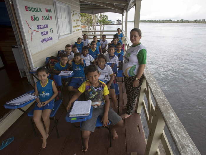 These kids have class on a floating school boat called Municipal School Sao Jose II. It travels along the Amazon River in a rural area of Manaus, Brazil.