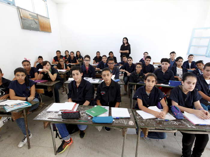 Teacher Manel el Ayachi watches over the class on the first day of a new school year at Linine Street Preparatory School in Tunis, Tunisia.