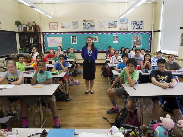 At the Boston Latin School in Boston, Massachusetts, teacher Elizabeth Moguel stands with her seventh-grade Latin class. Boston Latin School is the first and oldest public school in the US and was founded in 1635.