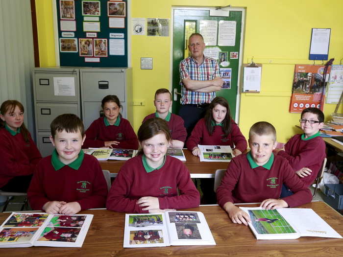 Students at Glenaan Primary School in the Glens of Antrim are ready to start the day with their teacher and school principal, Mr. Close. As with much of Northern Irish life, schools are still highly segregated by religion, with most schools either Protestant or Catholic. Integration is beginning to spread, however.