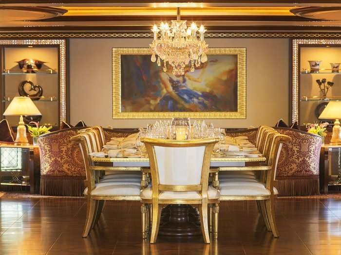 Every aspect of the vessel is beautifully maintained, right down to the chandelier that hangs over one of the many dining tables that can seat up to 12. On the far wall is a painting, an unusual fixture on any yacht but this one.