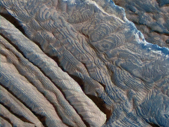 The Arabia Terra are highlands thought to be one of the oldest terrains on Mars. This is an image about 1.2 miles across showing part of the Arabia Terra, which stretches 2,800 miles across the surface. The uniform layers are each about 33 feet high.