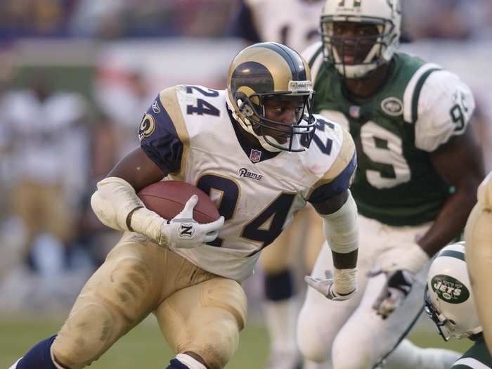 With the final pick in the first round of the 2000 Draft, the Rams picked Arizona running back Trung Canidate at no. 31.