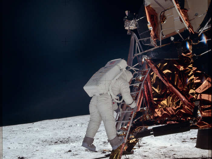 Apollo 11: Stepping down onto the moon for the first time.