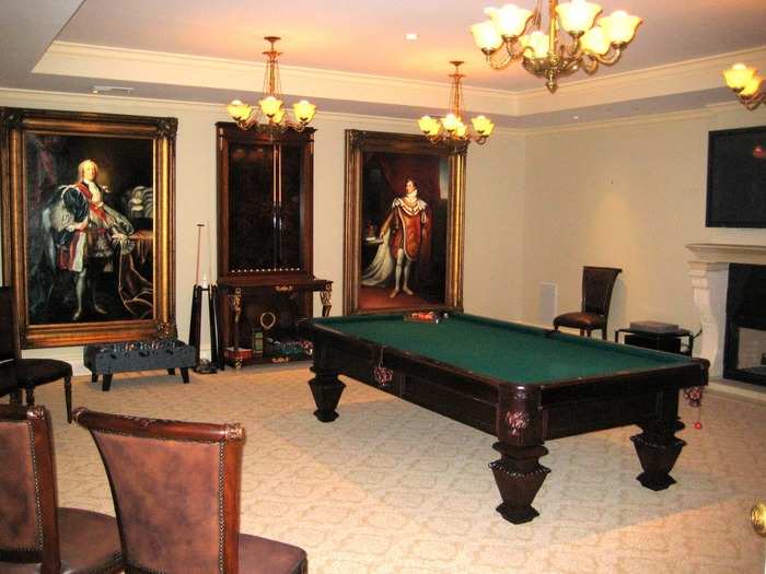 Between the golf course, the stately office, and this billiards room, the estate makes for an excellent space to entertain business guests. There