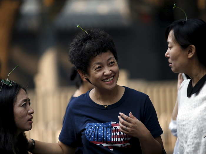 Sellers line the streets for people to purchase clips. During China