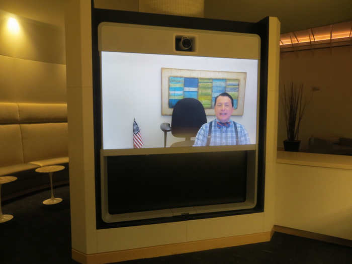 Instead it uses one receptionist and beams him around to about 10 other lobbies via videoconferencing. (We thought this man was just a video until he talked to us ...)