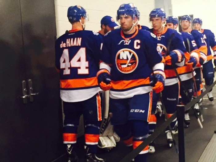 Islanders captain John Tavares leads the Islanders onto the ice for the 2nd period. Soon thereafter, Tavares tied the game at 1.