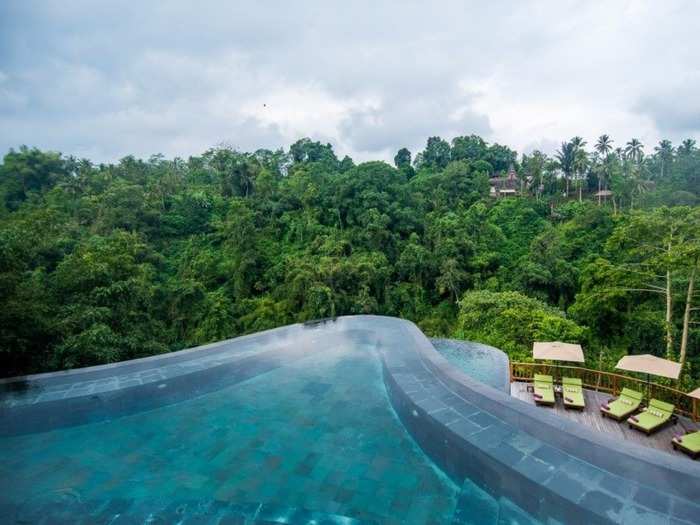 Take a dip in one of the multi-layered infinity pools at the Hanging Gardens in Ubud while surrounded by a lush and tranquil jungle.