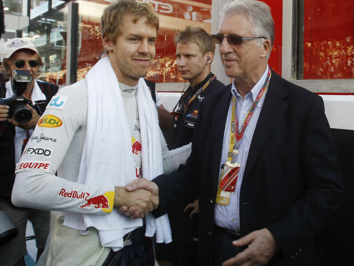 Piero with F1 racing star Sebastian Vettel in 2011. In 2014, Ferrari would hire the four-time world champion to lead its racing efforts.