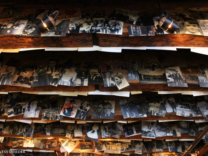 ... to the 800 images of daily life in Belfast, Northern Ireland, that hang from the ceiling in the taproom. The owners photocopied them from a magazine published in their hometown.