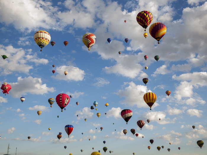 The festival is held in Albuquerque due to a wind pattern known as "the box" that makes it easier to navigate the giant balloons.