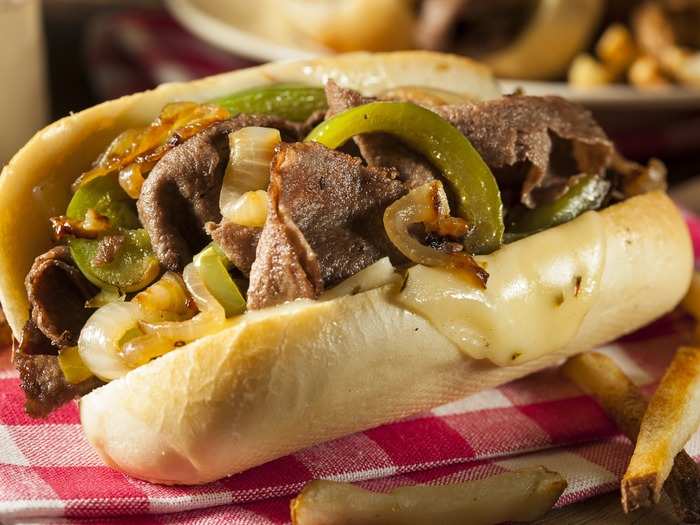 PENNSYLVANIA: Make sure to try the famous cheesesteak in Philadelphia, which consists of a long, crusty roll stuffed with rib eye beef and either melted Provolone cheese or Cheese Whiz. Toppings can include fried onions, mushrooms, and peppers.