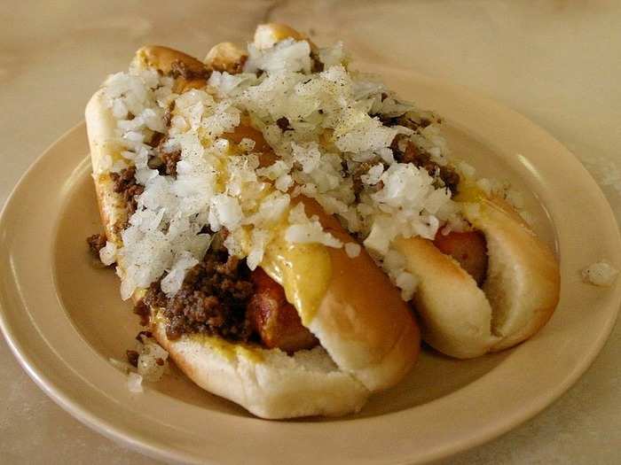 RHODE ISLAND: Hot Wieners (or New York System wieners) come in veal, pork, or beef varieties and are drenched in mustard, meat sauce, chopped onions, and celery salt before being sandwiched between a bun.