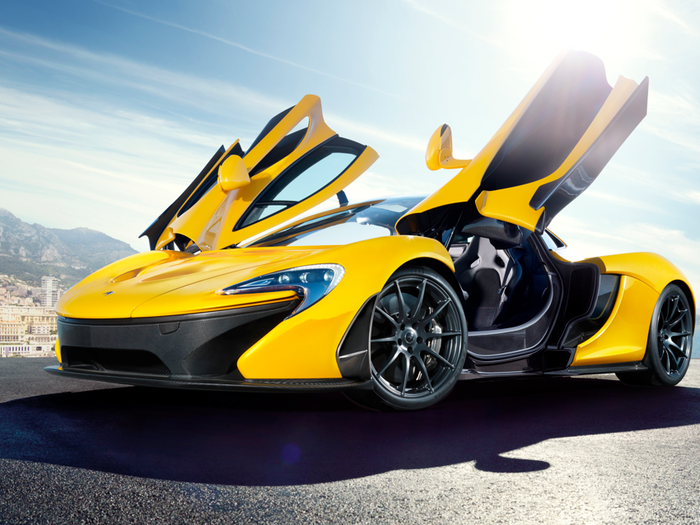 WITH THE DOORS UP: In a classic pose for any car with scissor or gullwing doors, the P1 cuts an impressive figure.