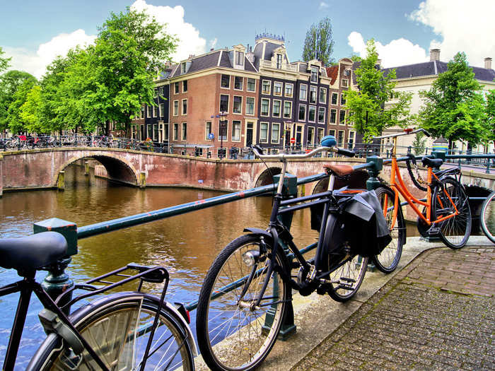 Bike alongside the canals of Amsterdam, Netherlands.