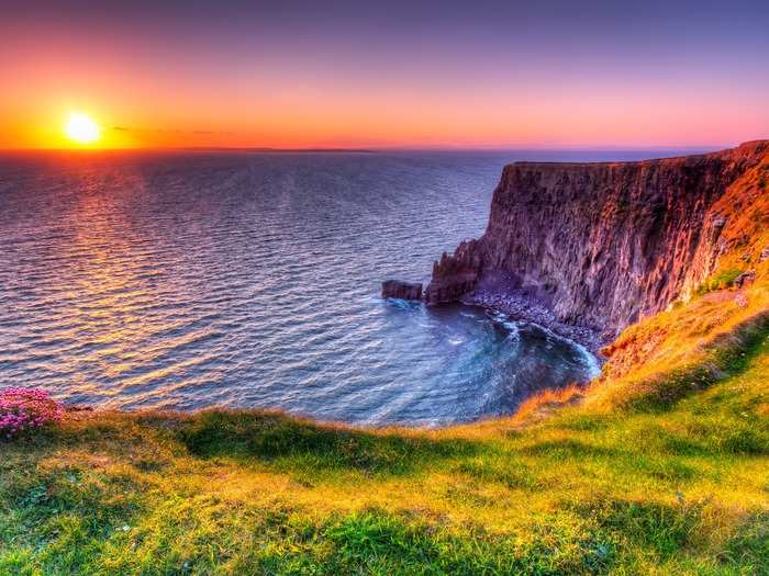 Test your limits and peer out from the edge of the Cliffs of Moher in Ireland.