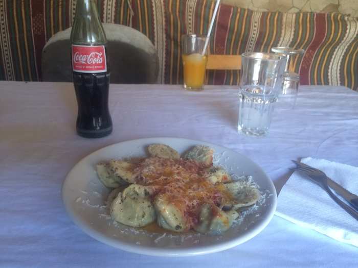 The food is amazing. I had ricotta and spinach ravioli, garnished with thick Parmesan cheese. The Pilier makes its own pasta, and brings a lot of its ingredients from Niamey in refrigerated trucks, from some 600 miles away.