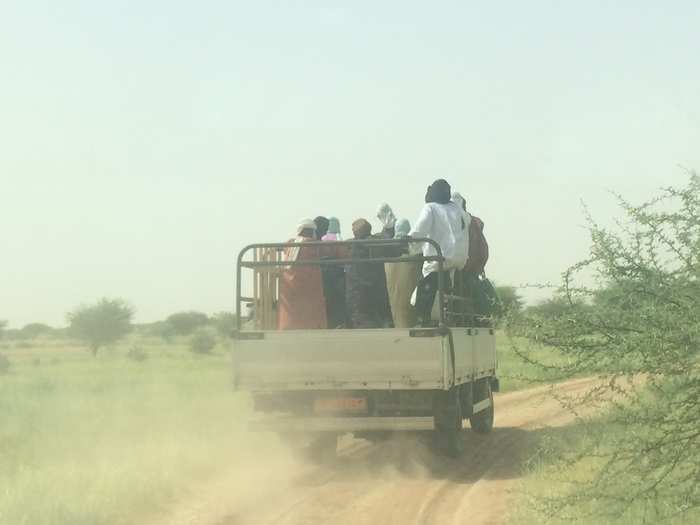 In northern Niger, a lot of people get around this way: by piling into the back of a pickup truck and setting out down an improvised dirt track.