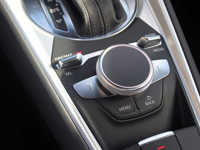 You can control the display from the steering wheel and from this handy dial — which doubles as a touch pad that you can write on with your finger.