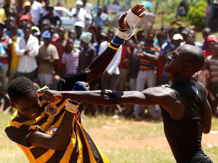 Musangwe boxing is an age-old tradition in northern South Africa. Men and boys display their fighting skills in an all-out battle with only three rules: the struggle continues until blood is shed, someone is knocked out, or a fighter surrenders by raising his hand.