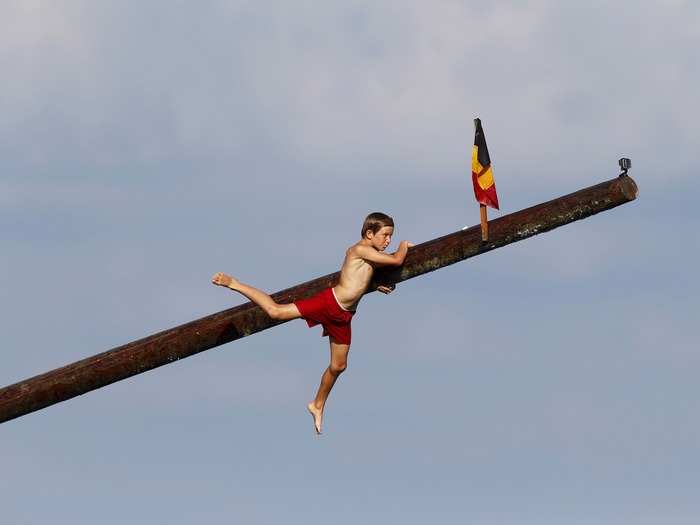 In the summer, hundreds of people flock to Malta to participate in the tricky game of trying to climb a "gostra," which is a pole covered in grease. Dating back to the Middle Ages, the game requires participants to make their way to the top of the slippery pole and uproot a flag to win prizes.