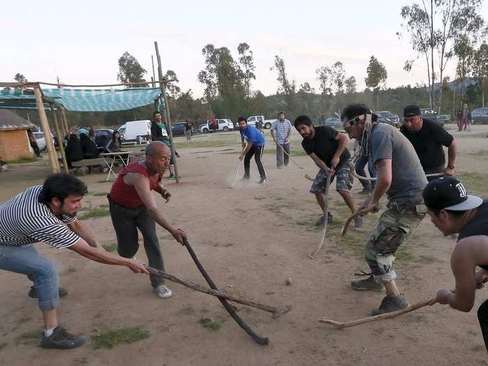 Palin is a traditional game from the Mapuche people of Chile and Argentina. The game is complex, but it basically involves two teams wielding curved sticks smacking a ball towards the end of the field to score. The game is more often considered a tradition than a competition, however.