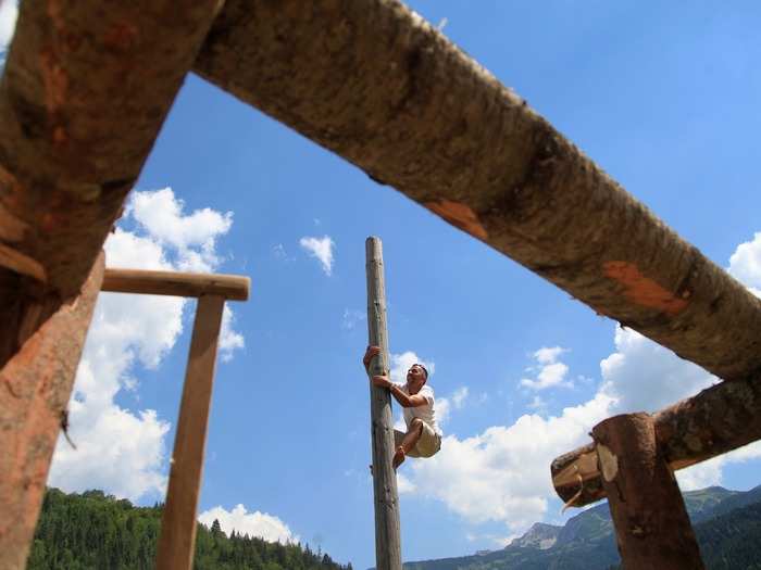 Every August, residents of Kosovo gather to participate in the Rugova Traditional Games. The games include tree climbing, stone throwing, wrestling, and tug-of-war.