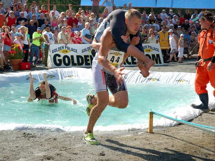 The sport of wife carrying was born in Finland. Male competitors must carry their female teammates while conquering an obstacle course.