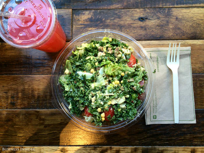 At last, my meal. I ordered an "Avocobbo" salad with egg, bacon, raw corn, roasted chicken, tomatoes, avocado, and blue cheese dressing on a bed of romaine and kale. I also went for the cranberry pear fresca drink, a seasonal specialty.