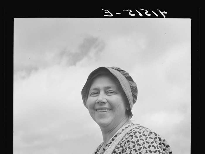 A farm woman works in fields along Route 79, just outside Ithaca, New York.