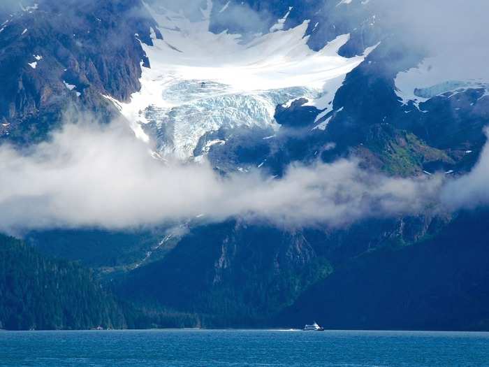 ALASKA: The ocean, ice, and mountains all meet at Kenai Fjords National Park in Seward, Alaska. Enjoy the park by foot or take a boat cruise along the coast in the summer.