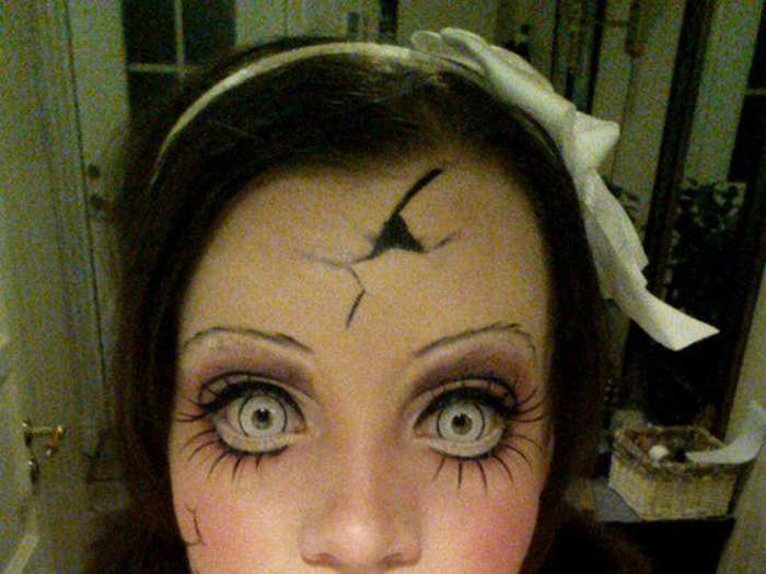 This person paired her intense makeup with fake contact lenses to take her costume to the next level.