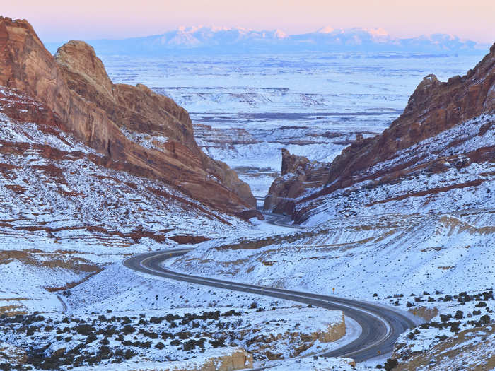 The Interstate 70, which runs through Utah, is most beautiful in winter, especially the section of the road that winds its way through the snow-covered Spotted Wolf Canyon.