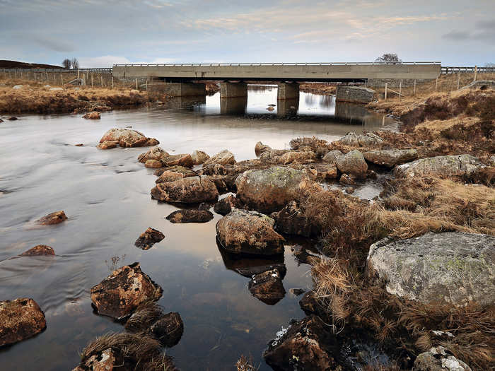 The long, remote A82 Road in Glencoe, Scotland, brings you amazing scenery and wonderful sights like the Rannoch Moor Bridge.