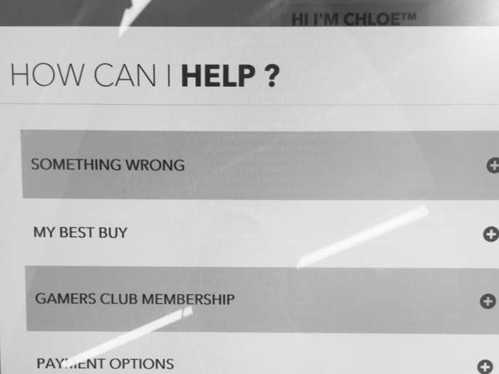 If she happens to be giving you a hard time, you can press a "Call a Blue Shirt" button to engage in human interaction with a Best Buy representative — either in the store or over the kiosk speakers.