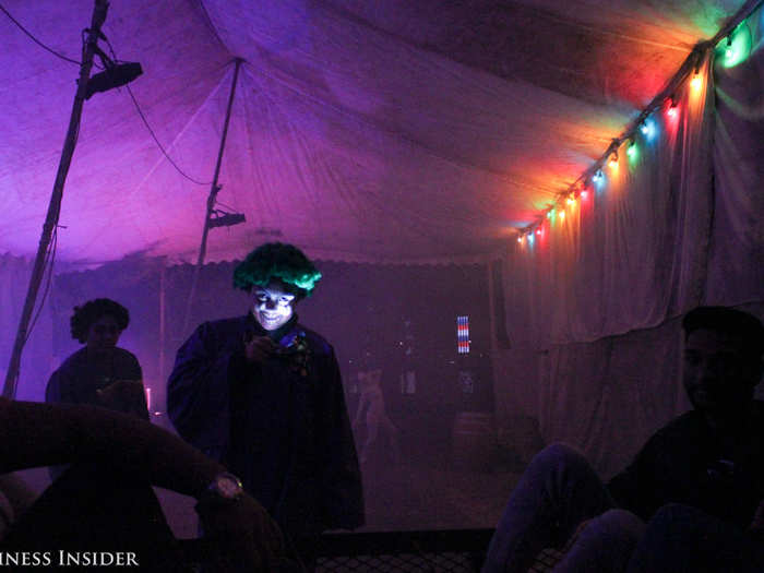 The same tent then turned into a creepy clown party. This guy was one of the strangest among the group, though other clowns were also dancing around us.