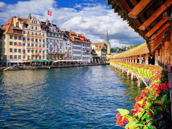 18. LUCERNE, SWITZERLAND — Covered bridges like the Kapellbrücke, towering mountain ranges, and Lake Lucerne are highlights of this Swiss town. Head to The Old Swiss House for delicious weiner schnitzel (breaded veal pounded thin and served with spätzle), and take a cable car up Mount Pilatus for stunning views.