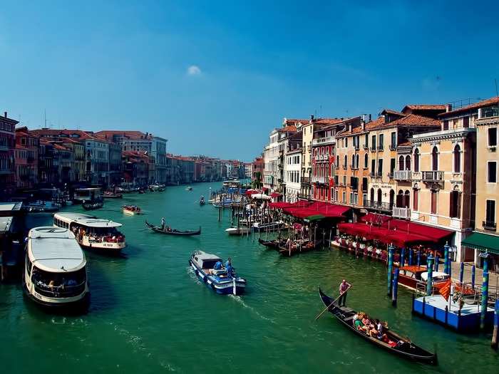 13. VENICE, ITALY — Some city dwellers drive cars; others row boats and gondolas. Venice does occasionally suffer from floods due to its canal system, but locals and tourists alike can enjoy waterfront dining and luxury shopping.