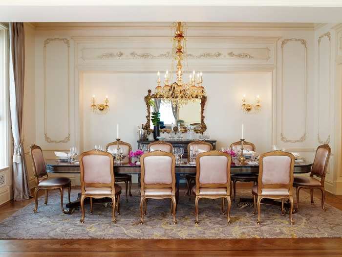 The Royal Plaza Suite offers 4,490 square feet of space and starts at $25,000 per night. Highlights include a grand piano, formal dining room, private elevator access, and a library stocked with hand-selected books by publisher Prosper Assouline.