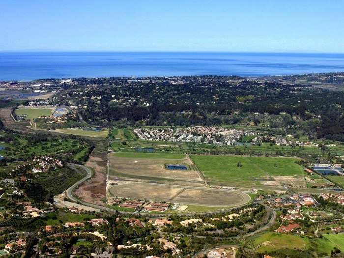 The property, known as the Rancho Paseana, includes a 3/4-mile racetrack, guesthouse, office, veterinarian