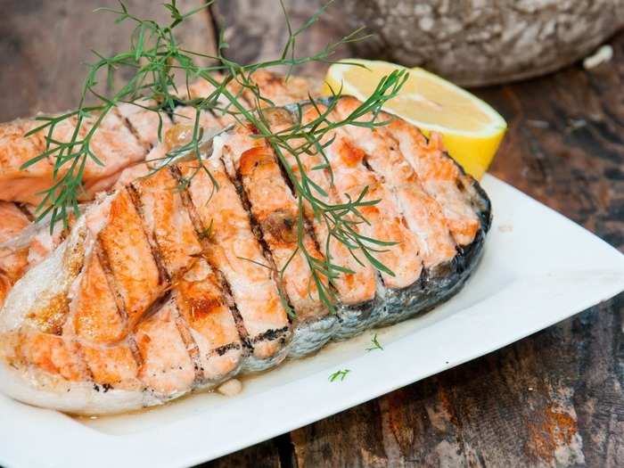 Grilled salmon, rice, and vegetables