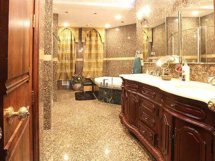 The master bathroom is filled with granite and has its own whirlpool.