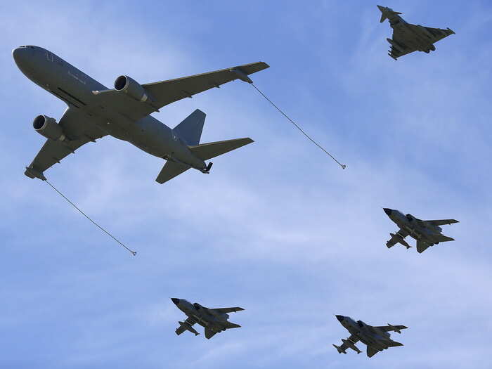 ... and aircraft flying in formations and refueling in midair.