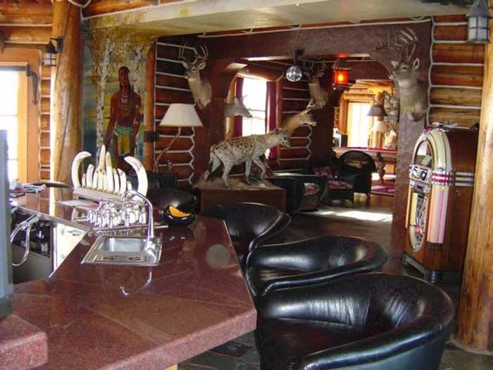 An excellent man cave, the bar area is festooned with taxidermy.