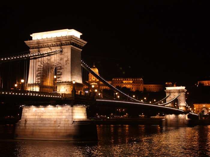 The iconic Széchenyi Chain Bridge connects Buda and Pest. You can walk or bike across the bridge, which offers incredible city views.