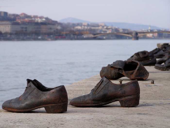 Sixty pairs of iron shoes belonging to men, women, and children line a portion of the Danube River honoring the Budapest Jews who were shot into the river by Arrow Cross militiamen between 1944 and 1945. Hungarian sculptor Gyula Pauer and Can Togay created the memorial.