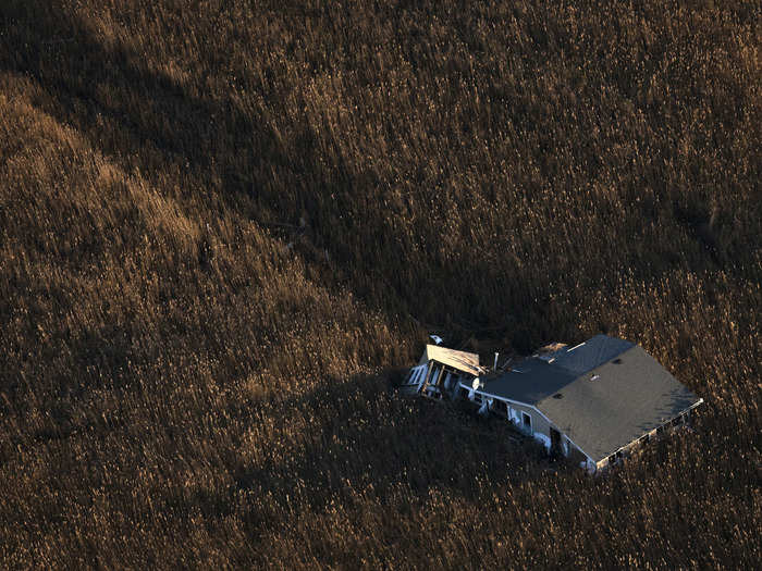 A house in Staten Island was pushed into marshland by the storm.